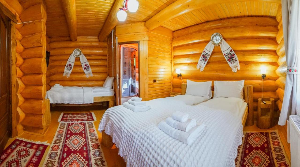 Casutele Din Moisei Hotel Buitenkant foto